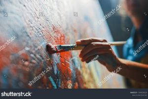 stock-photo-female-artist-works-on-abstract-oil-painting-moving-paint-brush-energetically-she-creates-modern-1540650029